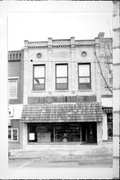 115 N MONROE ST, a Commercial Vernacular retail building, built in Waterloo, Wisconsin in 1907.