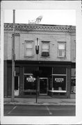 409 E MAIN ST, a Commercial Vernacular small retail building, built in Watertown, Wisconsin in 1867.