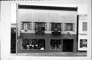209 W MAIN ST, a Commercial Vernacular large retail building, built in Watertown, Wisconsin in 1880.