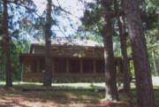 W9420 SCOVIL LAKE RD, a Rustic Style house, built in Minong, Wisconsin in 1925.