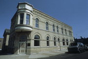 1213 55TH ST, a Queen Anne retail building, built in Kenosha, Wisconsin in 1896.