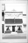 1516 COMMERCIAL ST, a Queen Anne retail building, built in Bangor, Wisconsin in 1891.