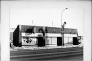 217-221 S 3RD ST, a Other Vernacular automobile showroom, built in La Crosse, Wisconsin in .