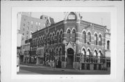 300 N MAIN ST, a Early Gothic Revival large retail building, built in La Crosse, Wisconsin in 1881.