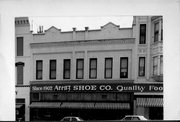 323 PEARL ST, a Commercial Vernacular retail building, built in La Crosse, Wisconsin in 1885.