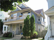 1022-1024 S LAYTON BLVD, a Queen Anne duplex/two-flat, built in Milwaukee, Wisconsin in 1892.
