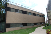 2121 W WISCONSIN AVE, a International Style small office building, built in Milwaukee, Wisconsin in 1954.