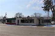 2236-2242 State Road (STH 33), a Commercial Vernacular retail building, built in La Crosse, Wisconsin in 1955.
