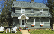 601 CHAPMAN ST, a Dutch Colonial Revival house, built in Madison, Wisconsin in 1931.
