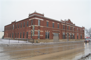 2219 SOUTH AVE, a Romanesque Revival livery/stable, built in La Crosse, Wisconsin in 1902.