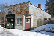 S864 STH 88, a Boomtown garage, built in Gilmanton, Wisconsin in 1900.