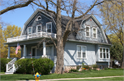 405 S WISCONSIN ST, a Dutch Colonial Revival house, built in De Pere, Wisconsin in 1909.