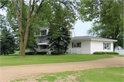 4790 STH 19, a Dutch Colonial Revival house, built in Westport, Wisconsin in 1950.