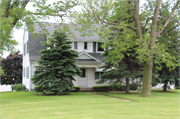 4790 STH 19, a Dutch Colonial Revival house, built in Westport, Wisconsin in 1950.