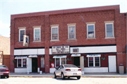 13-15 N WISCONSIN ST, a Commercial Vernacular retail building, built in Darien, Wisconsin in 1915.