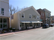 211 W WATER ST, a Front Gabled retail building, built in Shullsburg, Wisconsin in 1842.