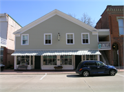 211 W WATER ST, a Front Gabled retail building, built in Shullsburg, Wisconsin in 1842.