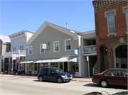 211 W WATER ST, a Front Gabled retail building, built in Shullsburg, Wisconsin in 1842.
