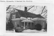 CHESTNUT ST, S, 209, a Dutch Colonial Revival house, built in Ellsworth, Wisconsin in .