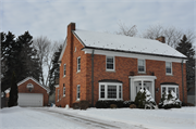 1122 LINCOLN BLVD, a Colonial Revival/Georgian Revival house, built in Manitowoc, Wisconsin in 1940.