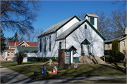 403 MULBERRY ST, a Front Gabled house of worship, built in Lake Mills, Wisconsin in 1860.