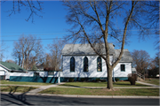 403 MULBERRY ST, a Front Gabled house of worship, built in Lake Mills, Wisconsin in 1860.