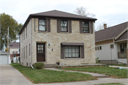 2536 N 72nd Street, a Colonial Revival/Georgian Revival duplex, built in Wauwatosa, Wisconsin in 1945.