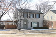 9221 Jackson Park Boulevard, a Colonial Revival/Georgian Revival house, built in Wauwatosa, Wisconsin in 1945.
