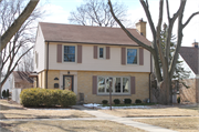 9233 Jackson Park Boulevard, a Colonial Revival/Georgian Revival house, built in Wauwatosa, Wisconsin in 1946.