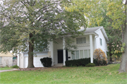 1970 N Menomonee River Parkway, a Neoclassical/Beaux Arts house, built in Wauwatosa, Wisconsin in 1969.