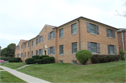 7916 W North Avenue, a Colonial Revival/Georgian Revival apartment/condominium, built in Wauwatosa, Wisconsin in 1950.