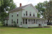 106 MAIN ST, a Greek Revival house, built in Montello, Wisconsin in 1874.