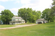 106 MAIN ST, a Greek Revival house, built in Montello, Wisconsin in 1874.