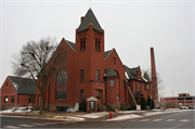 420 WILSON AVE, a Romanesque Revival church, built in Menomonie, Wisconsin in 1892.