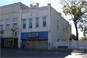 614 MAIN ST E, a Commercial Vernacular small retail building, built in Menomonie, Wisconsin in 1895.