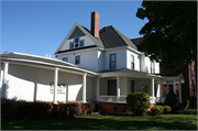 615 WILSON AVE, a Colonial Revival/Georgian Revival house, built in Menomonie, Wisconsin in 1905.