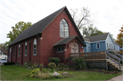 1002 6TH ST E, a Early Gothic Revival church, built in Menomonie, Wisconsin in 1916.