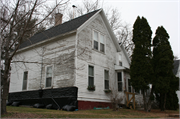1203 14TH AVE E, a Gabled Ell house, built in Menomonie, Wisconsin in 1890.