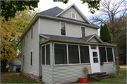 1301 9TH ST E, a Two Story Cube house, built in Menomonie, Wisconsin in 1900.