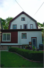 3324 N SHEPARD AVE, a Dutch Colonial Revival house, built in Milwaukee, Wisconsin in 1909.