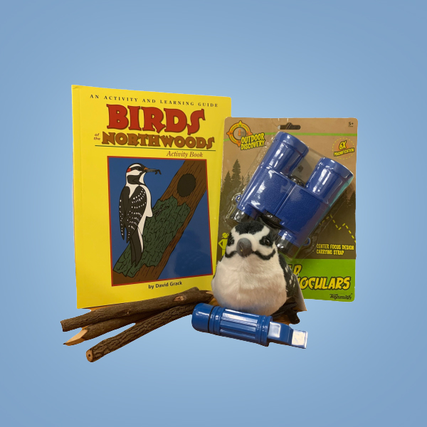 Prize Pack 2 for Member Month 2022. Birds of the Northwood Activity Book, Kids Outdoor Binoculars, Plush song bird, pencils made from rough sticks, and a whistle.