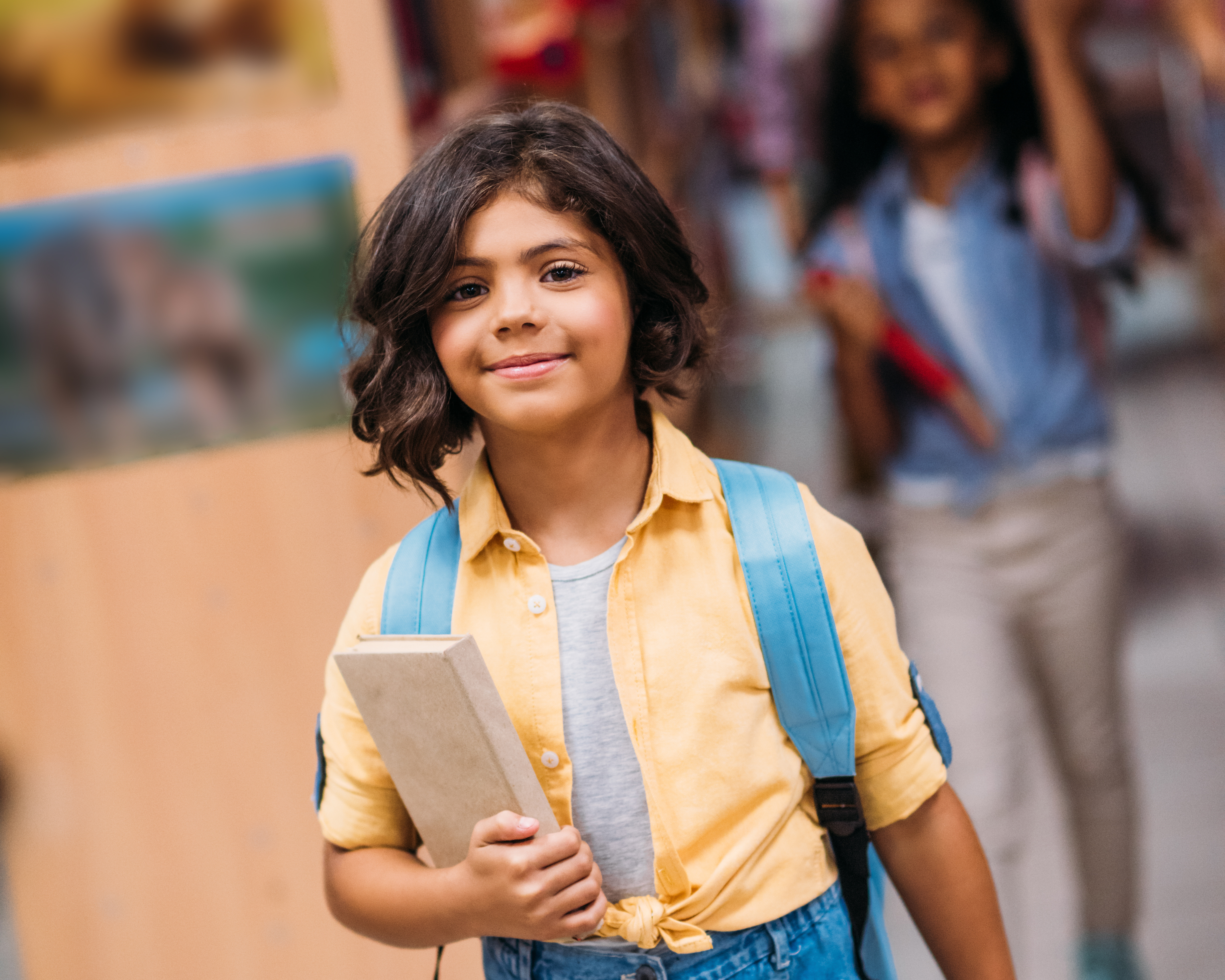 Girl in a library with friends and getting some books and some new experiences.