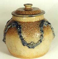 Art pottery jar and lid.